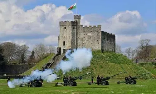 With artillery guns and flowers, Britain salutes Prince Philip