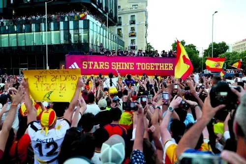 Spain stars lap up adulation of estimated two million on parade