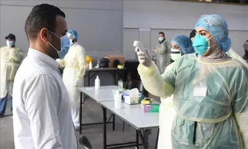 العاملون في الخطوط الأمامية للقطاع الصحي في البحرين يطالبون بالتعويض