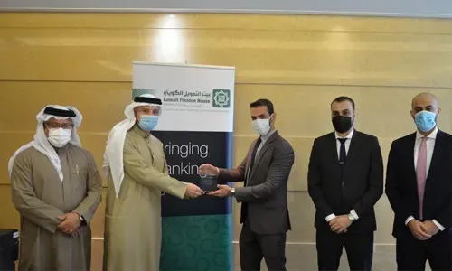 بيت التمويل الكويتي - البحرين يحصل على جائزة التميز في المعالجة المباشرة (STP) من جي بي مورغان