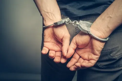 Two men arrested for impersonating officers, robbery