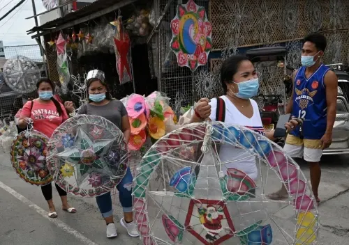 فلبينيون يحتفلون بمحاولات إنقاذ عيد الميلاد من فيروس كورونا