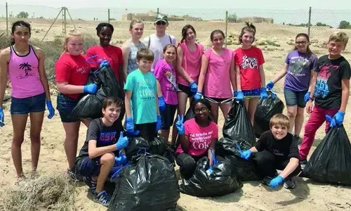 They sweat a lot to keep beach clean!