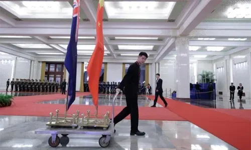 China, New Zealand ink trade deal as Beijing calls for reduced global barriers
