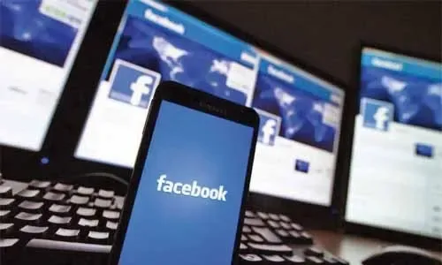 Facebook to test news story paywalls: report
