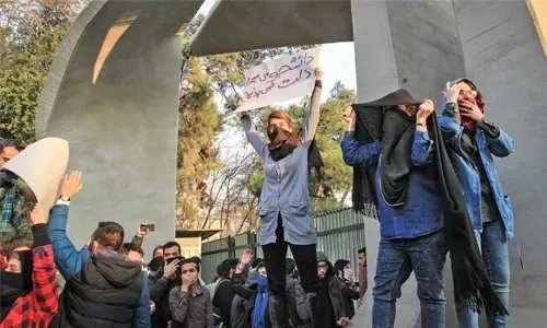 Iran government warns as protests gather momentum