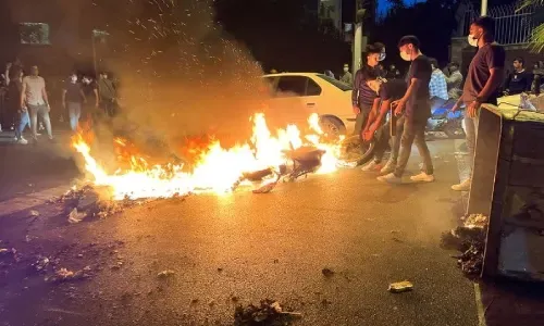 Protesters rally across Iran in third week of unrest over Amini’s death