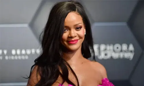 Rihanna sues her father