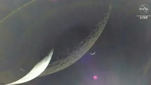 Nasa's Orion capsule makes its closest approach to the moon
